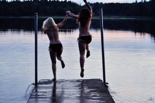 Girl surprised skinny dipping friends image