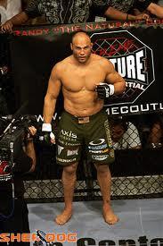  Autors: NEOVO Randy Couture