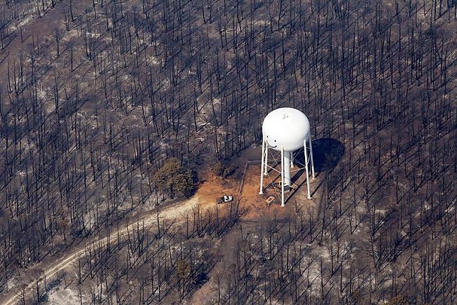 Mežs tika iznīcināts ar uguni... Autors: Drug Dealer 10 foto, kas satricināja pasauli 2011. gadā.