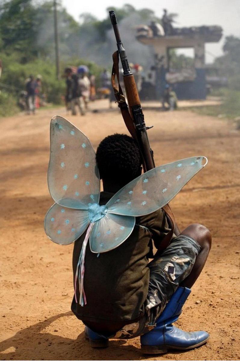 Jūs redzējāt cik man modīgi... Autors: Viens Zeks Āfrikas partizānu formastērpi.